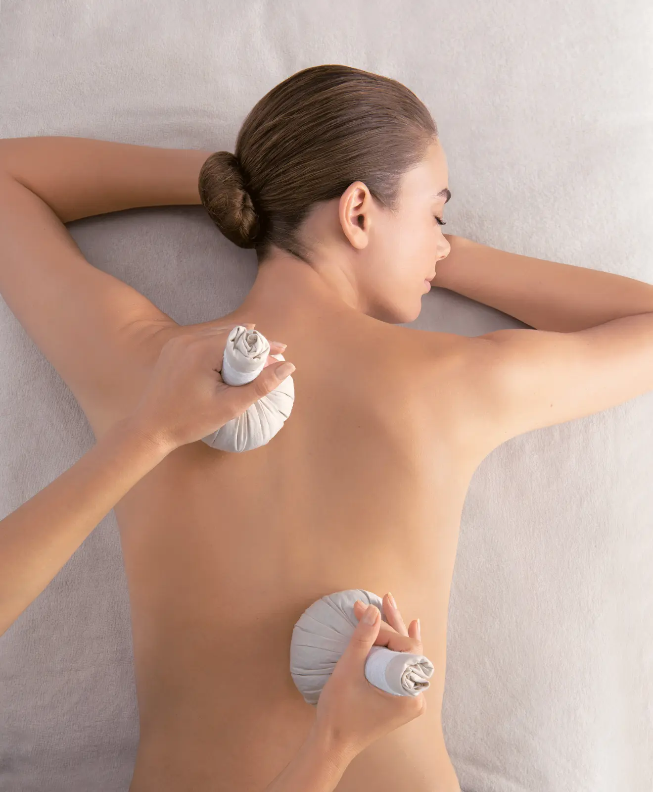 Massage "Lomi Lomi aux ballotins de sable chaud" - 60 min