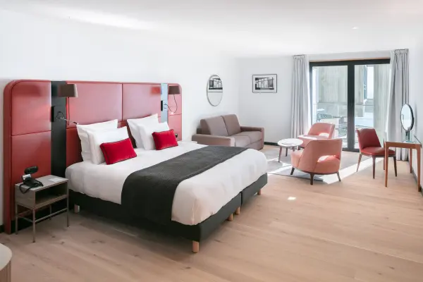 L'Echappée Conquétoise en chambre Deluxe — visuel 1